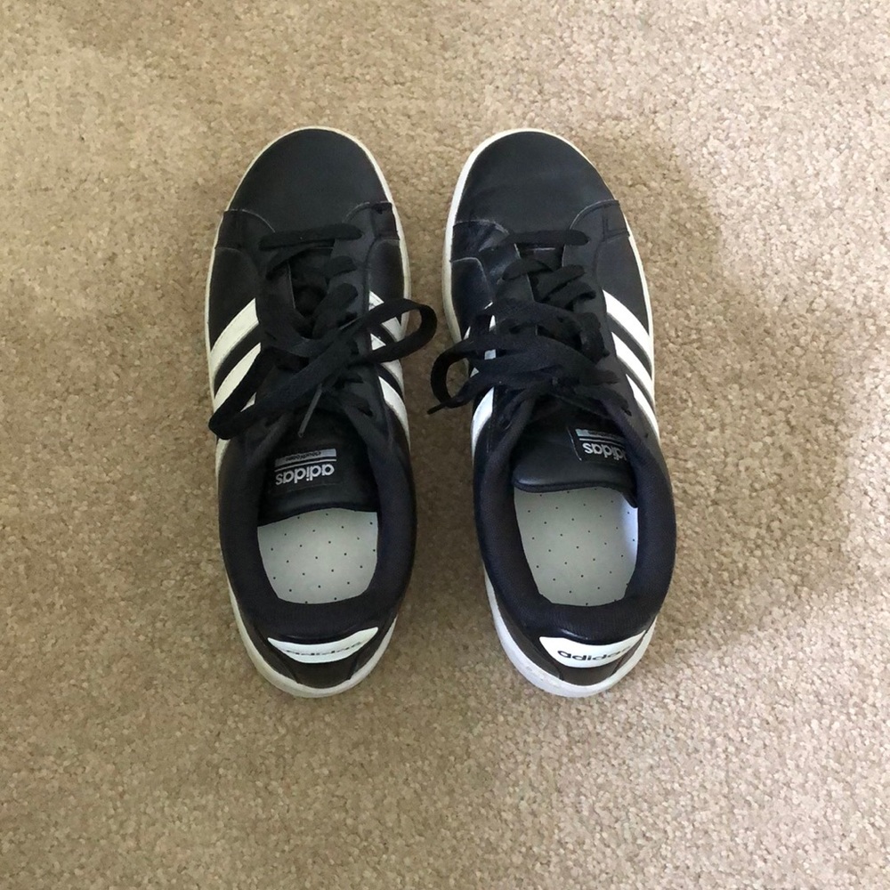 Back with white striped adidas